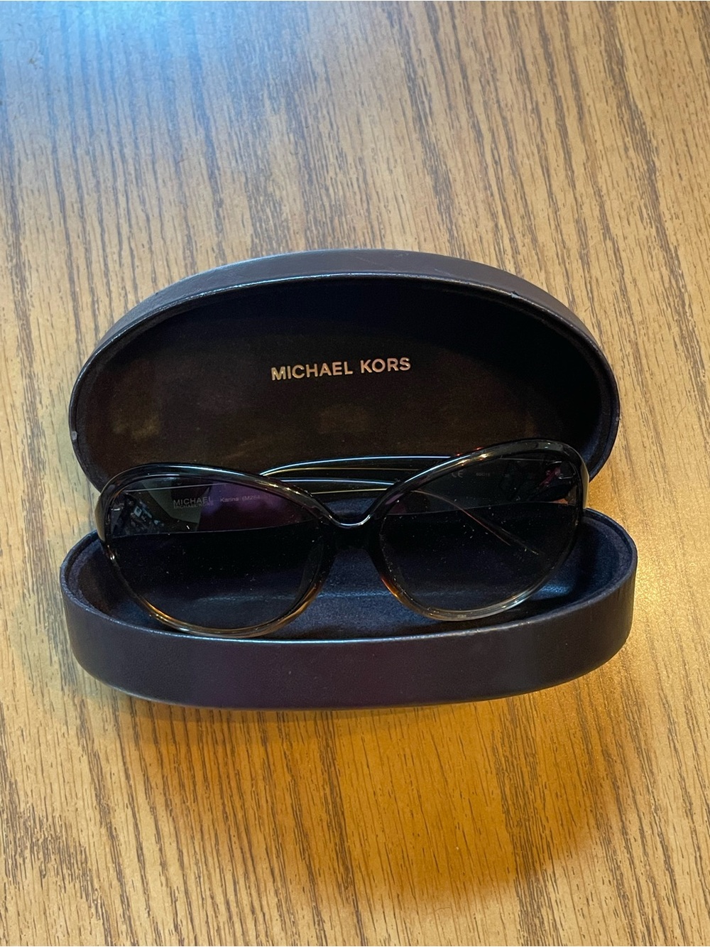 Michael Kors sunglasses.